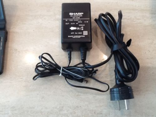 original 8.5VDC 1A AC adapter for SHARP ZAURUS ZR5000 PDA